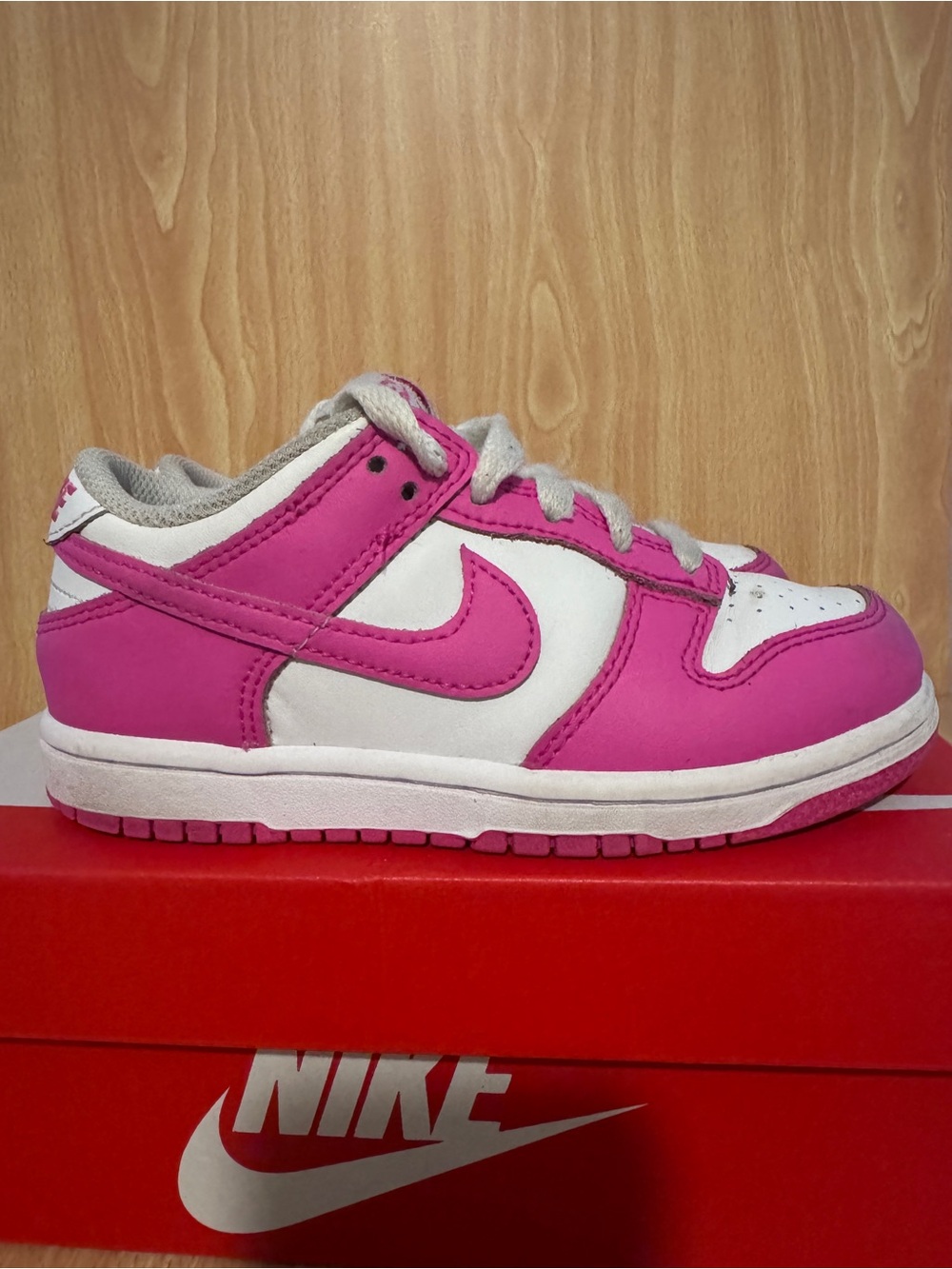Nike Dunk Low Kids Low-Top Sneakers in White and Pink
